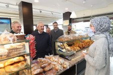 Başkanlar esnaf turu  için Yenikent’te